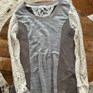 Long sleeve sweater with lace arms. All lace is in perfect condition!